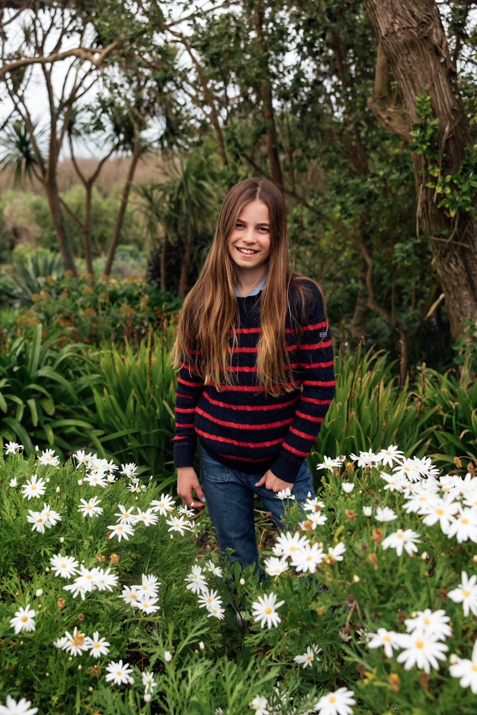 Princess Charlotte 11th Birthday Portrait smiling in Cornwall field royal family photo